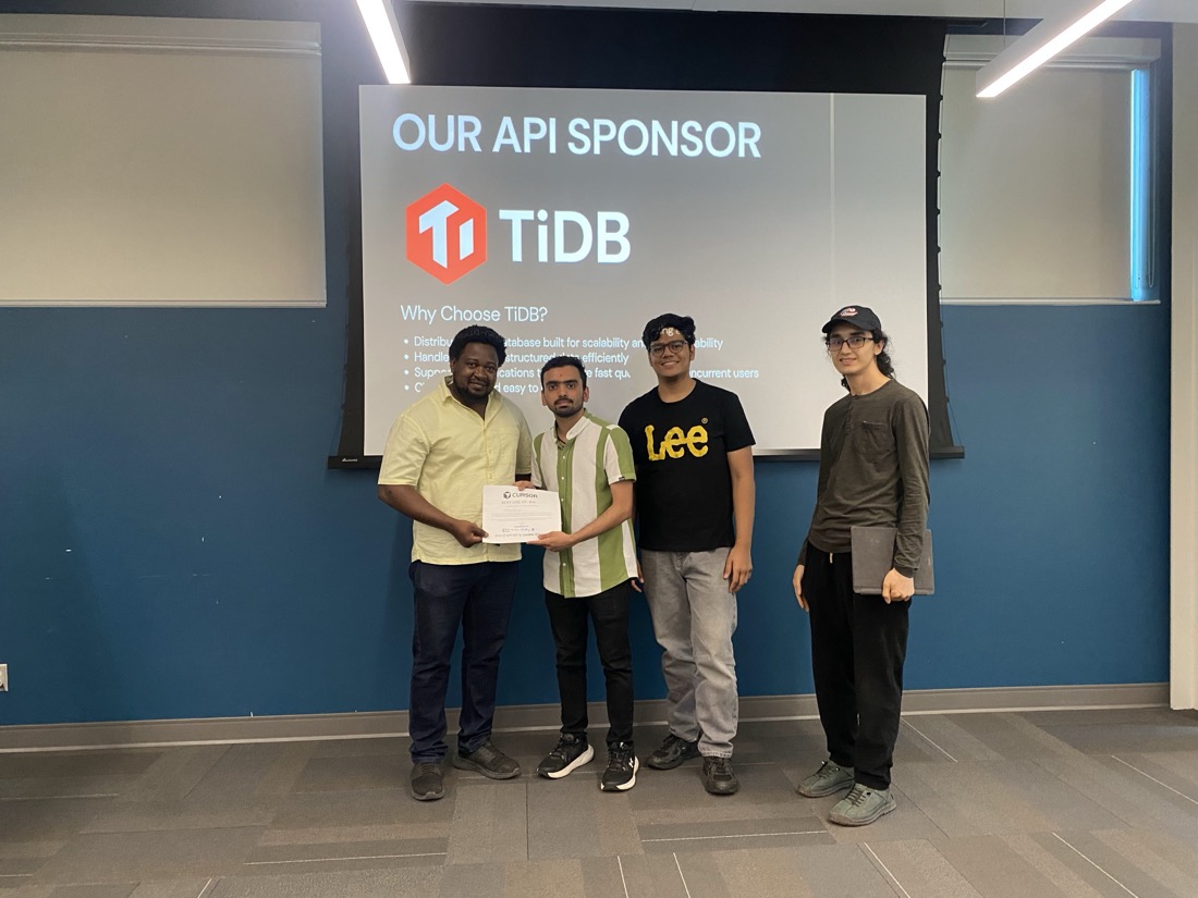 Team Handofgod receiving the Best Use of TiDB and Valencia award for MineVoice